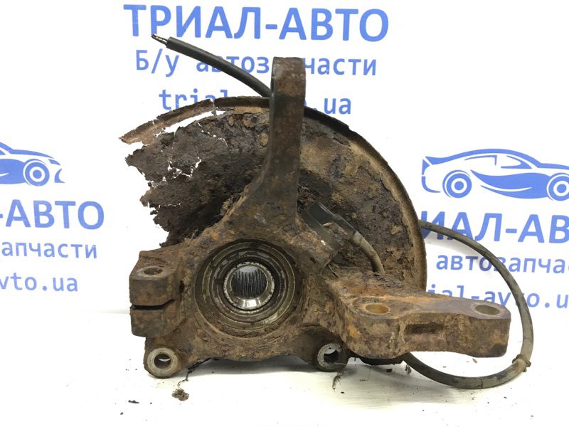 Кулак поворотный левый со ступицей Mitsubishi Outlander 2003-2007