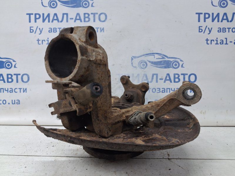 Кулак поворотный левый со ступицей Volkswagen Caddy 2K 1.9 DIESEL BJB 2003 (б/у) Кулак поворотный левый со ступицей Volkswagen Caddy 2K 1.9 DIESEL BJB 2003 (б/у)