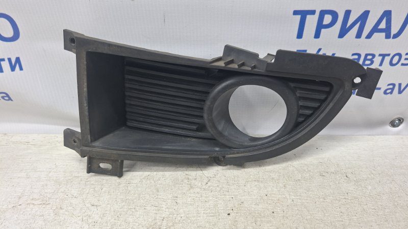 Решетка противотуманки левая Mitsubishi Lancer 2003-2009 (Арт. 74476) Решетка противотуманки левая Mitsubishi Lancer 2003-2009 (Арт. 74476)